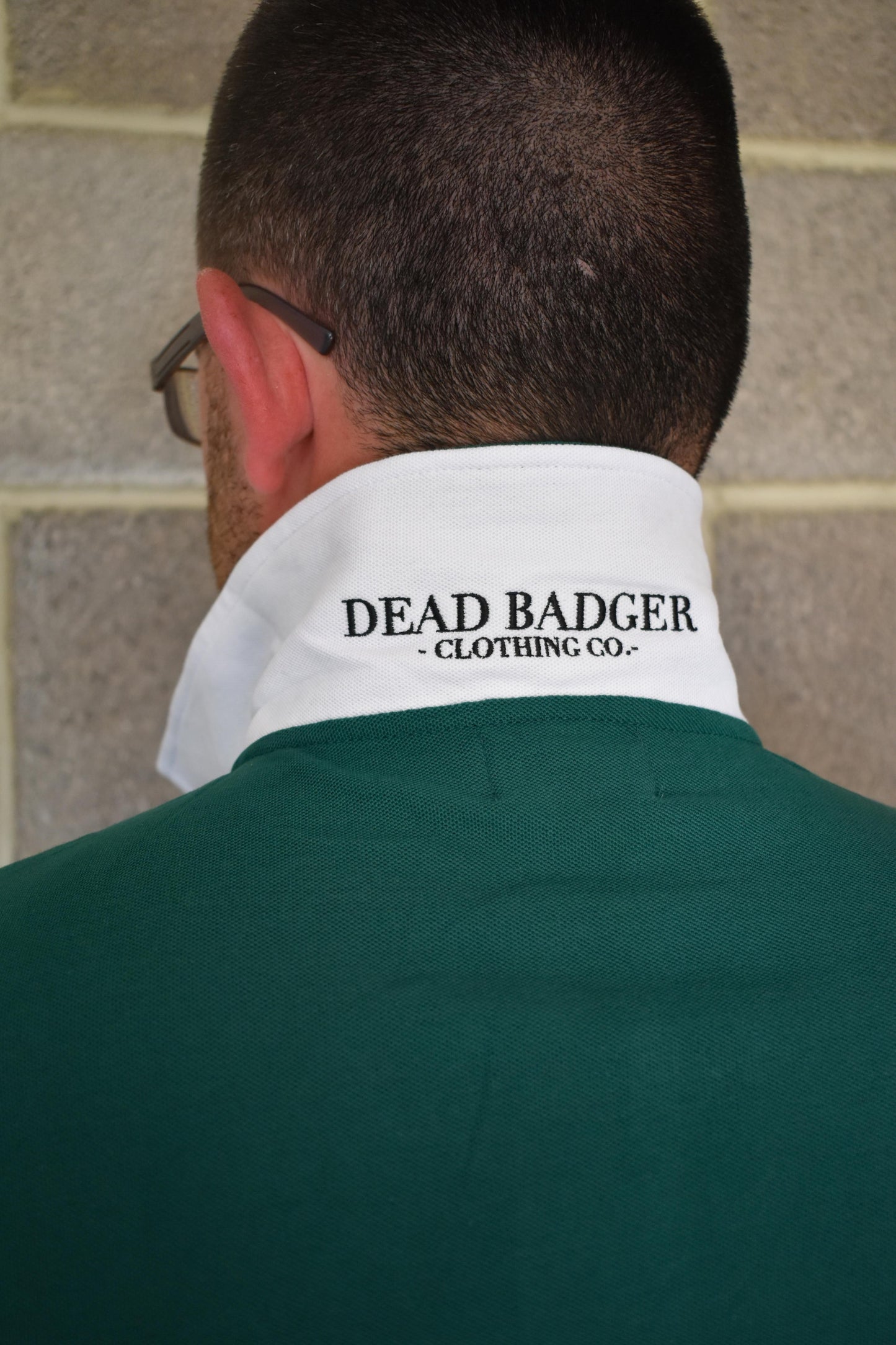 Dead Badger Clothing green polo detail