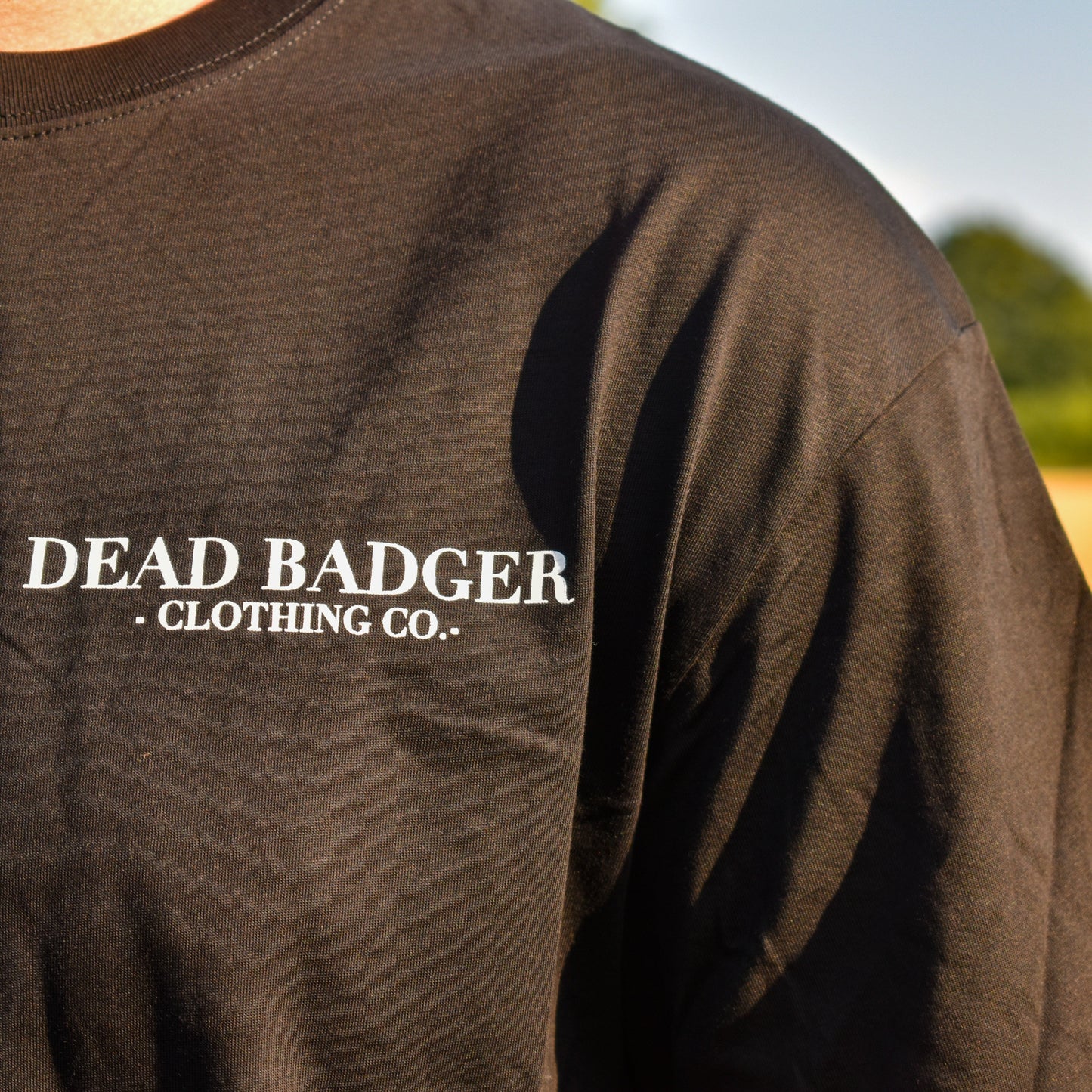 Dead Badger Clothing black graphic tee close up