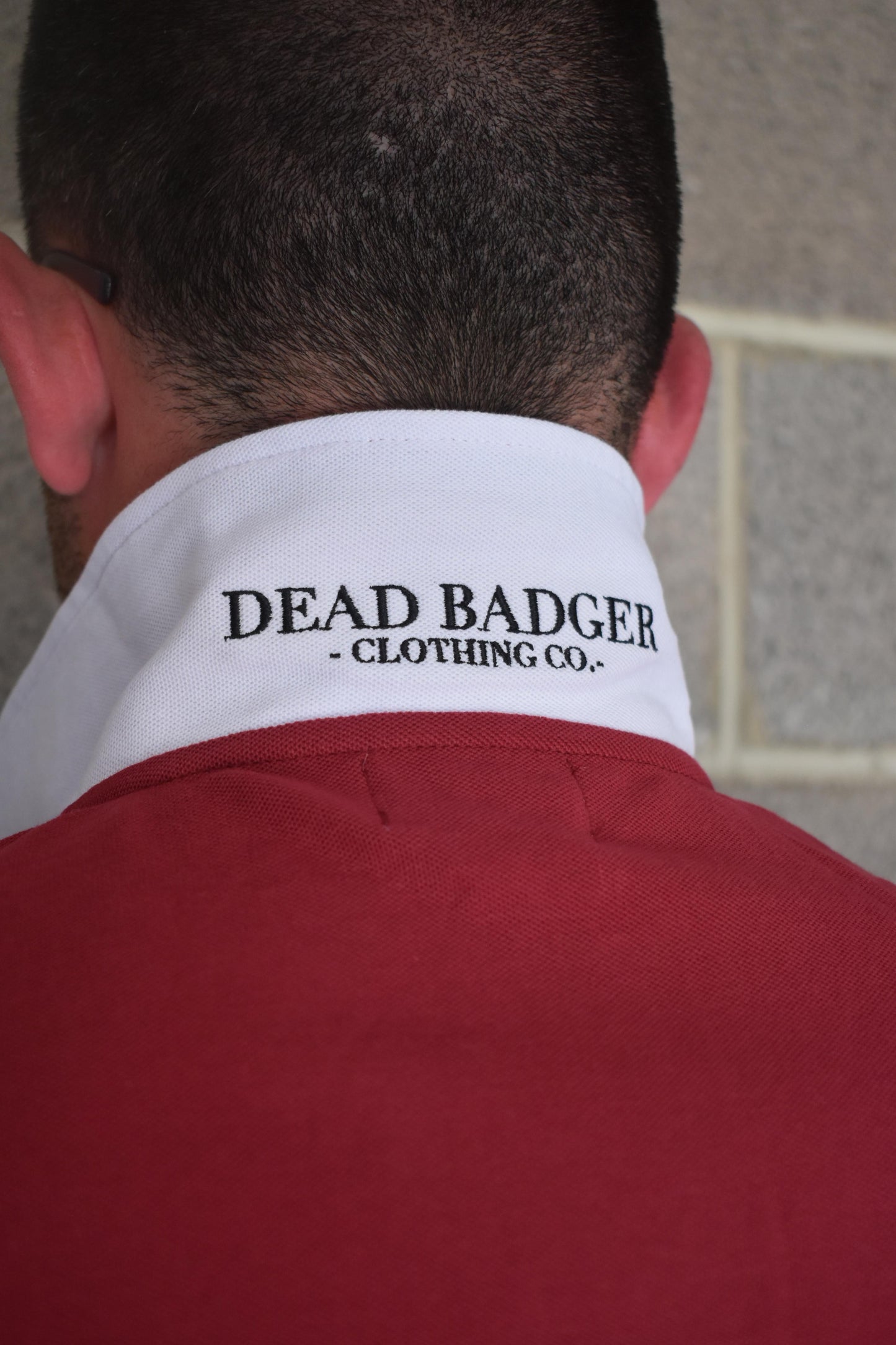 Dead Badger Clothing red polo detail
