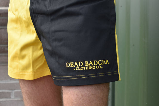 Dead Badger Clothing black and yellow shorts close up