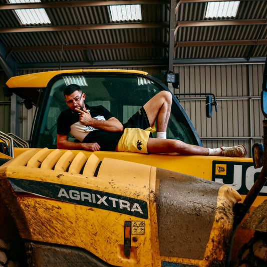Dead Badger Clothing black and yellow shorts lifestyle