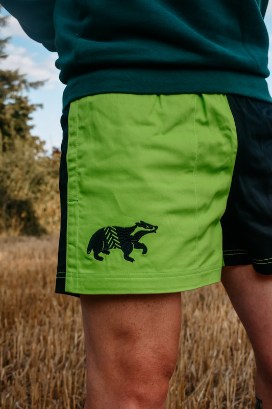 Dead Badger Clothing black and lime shorts close up