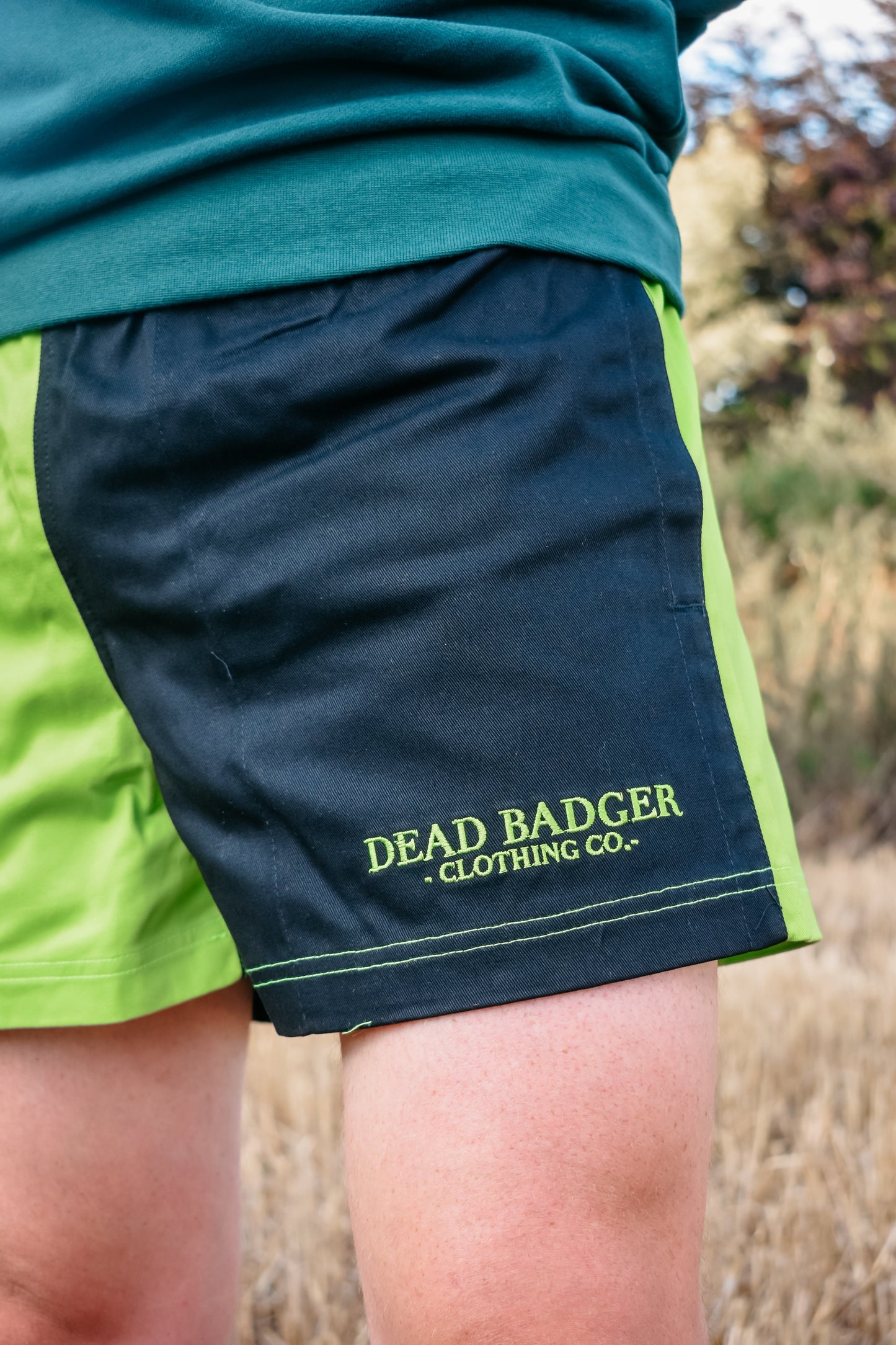 Dead Badger Clothing black and lime shorts detail